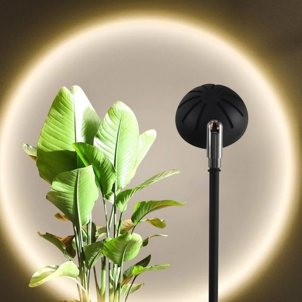 Lampada da terra proiezione tramonto design minimalista — in ambiente