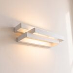 Lampada da parete design in acciaio bianco